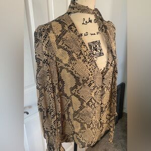 Zara Black and Tan Animal print top V- neck with buttons and tie neck